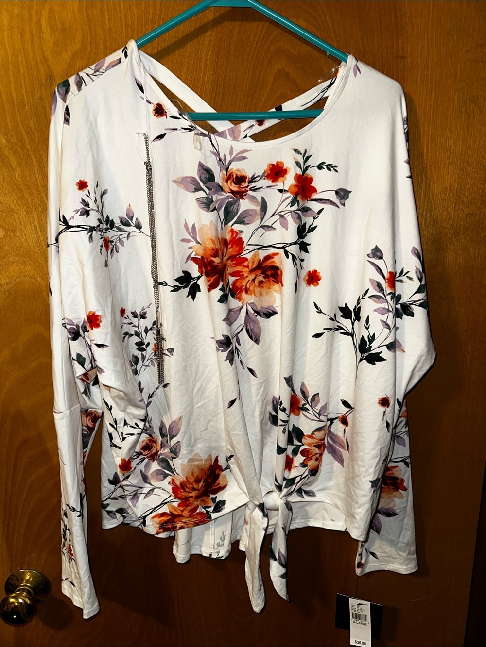 long-sleeve, white floral blouse by iZ Byer